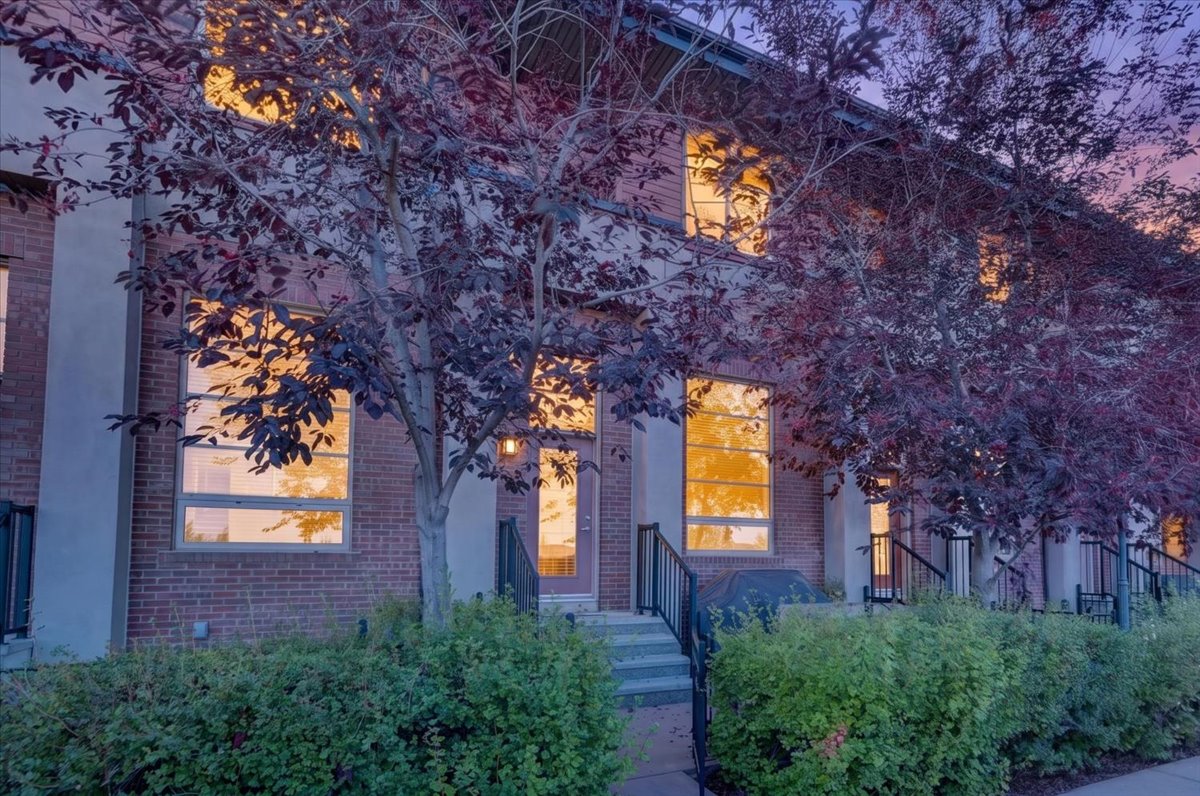 Twilight exterior of 73 Aspen Hills Terrace SW in Aspen Woods, Calgary